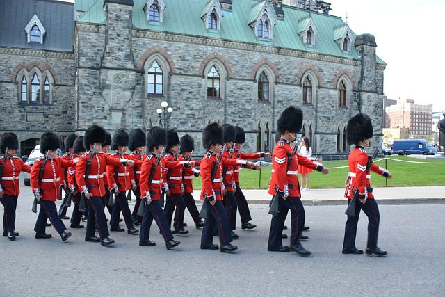 Kings Guard marching at Buckinghams Palace in London, United Kingdom